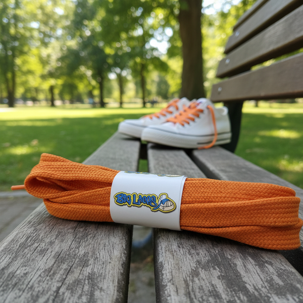 a pair of flat 11mm wide orange shoelaces suitable for adidas superstar shoes
