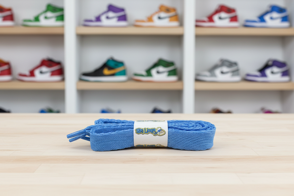 a pair of flat azure blue 20mm wide shoelaces