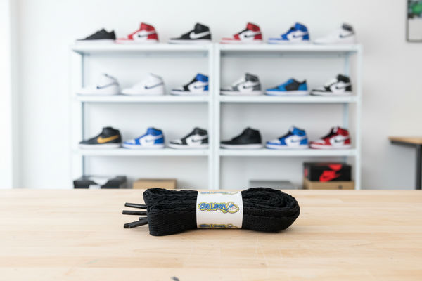 a pair of flat black 20mm wide shoelaces