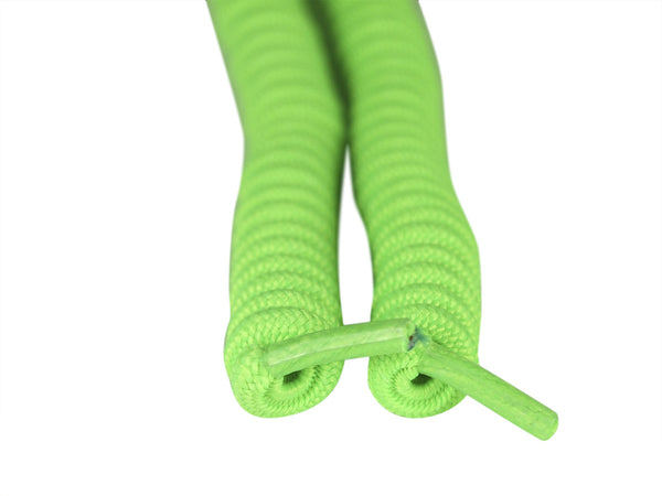 a pair of Curly Neon Green Shoelaces